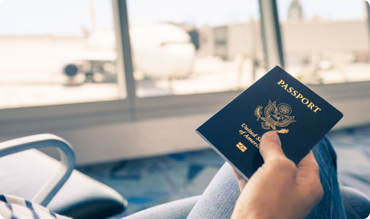 Person with passport waiting at airport 